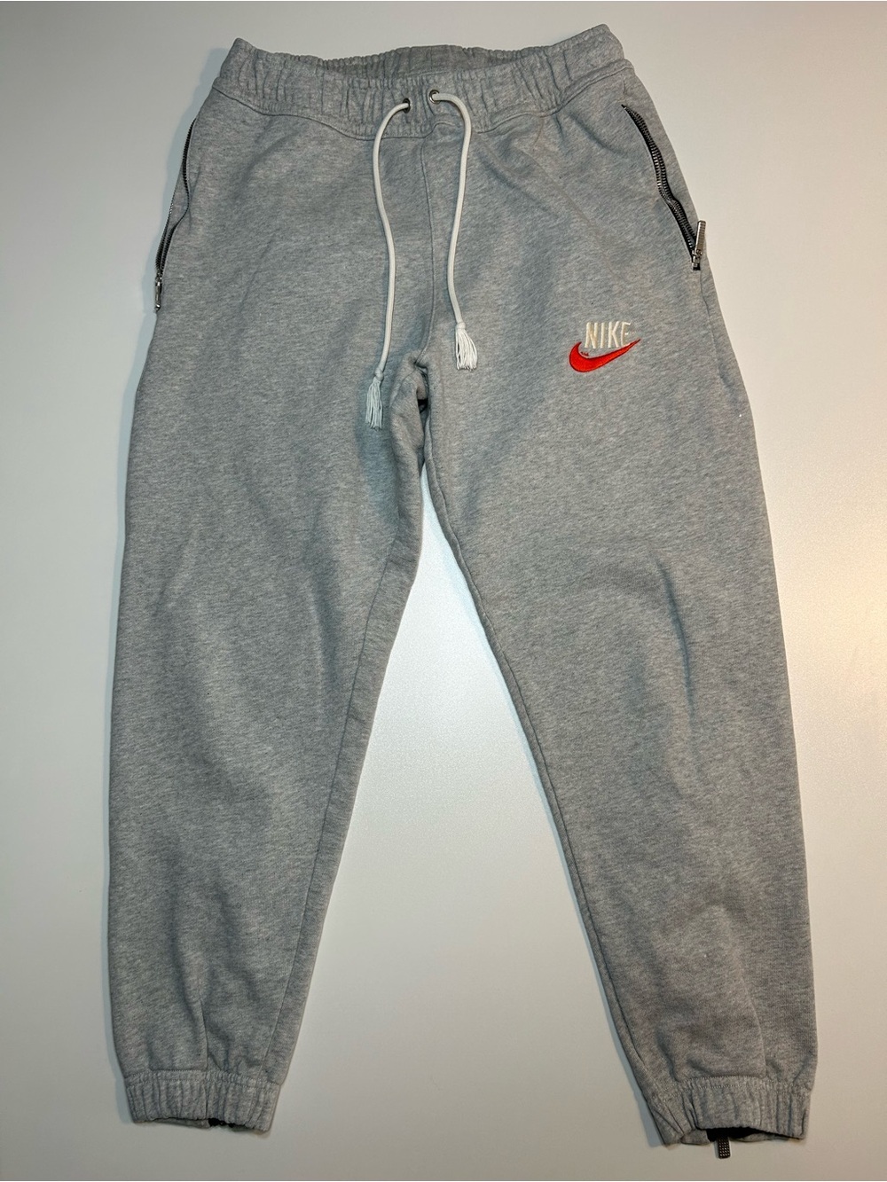 Nike Sportswear NSW Trend Sneaker Pants Grey Retro Script Orange Swoosh Joggers